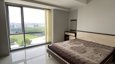 Apartemen The Mansion Aurora Semi Furnish Rapih Lantai Sedang